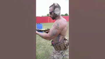 Gold Glock with Suppressor
