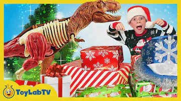 Christmas for the Dinosaurs! Opening Dinosaur Presents from Santa & Jurassic World Surprise Toys
