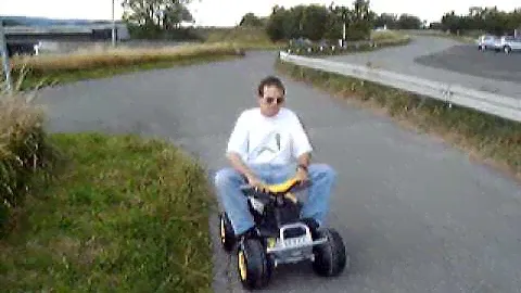Me on the Peg-Perego Corral T-Rex climbing a 6% hill