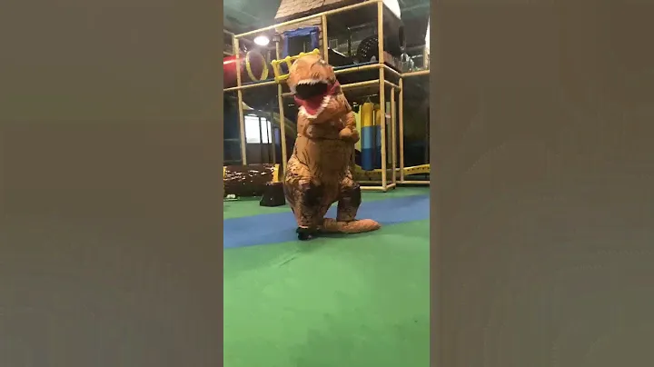 Bailey dancing in the T-Rex costume